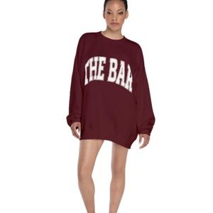 Brand new The Bar Varsity sweatshirt in color Maroon. Size XL.